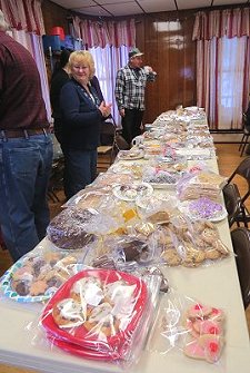 Becky Lounsbury mans a bake sale fundraiser for daughter Lisa.